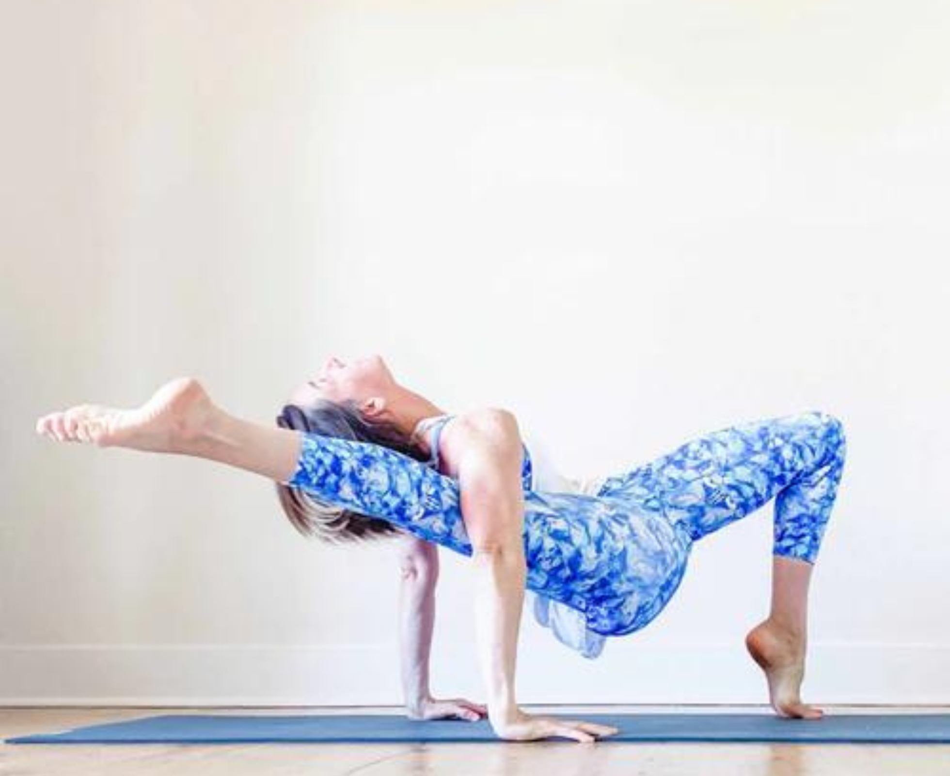 Women doing a yoga pose 