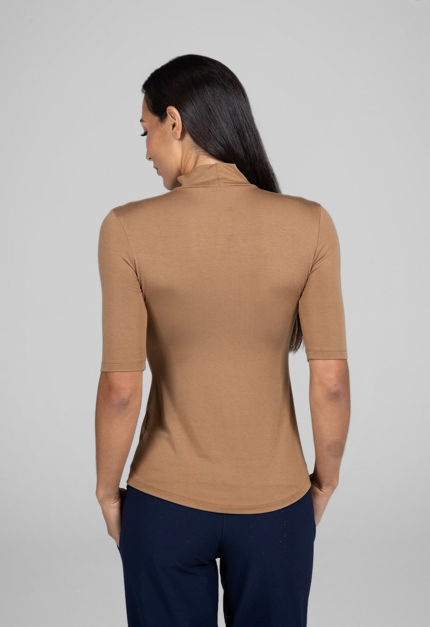 Soft camel-colored tee with a mock neck design, providing a comfortable and stylish fit.