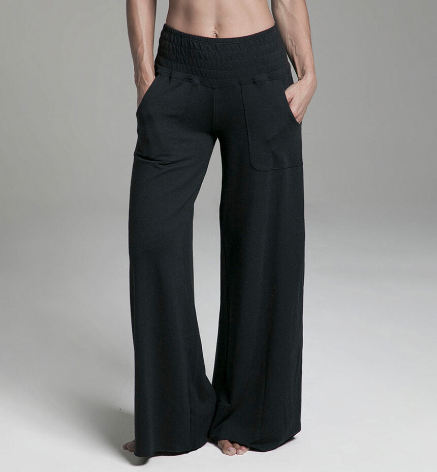 Soft and cozy French terry fabric in black, featuring a smooth leg and looped texture on the waistband.